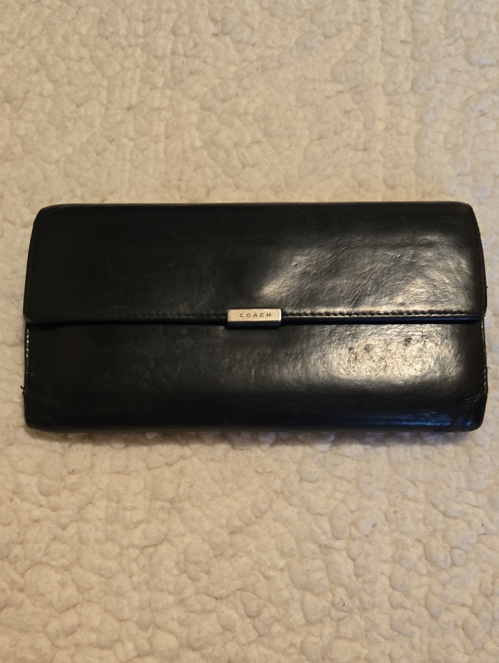Coach Black Leather Flap Wallet with Metal Logo